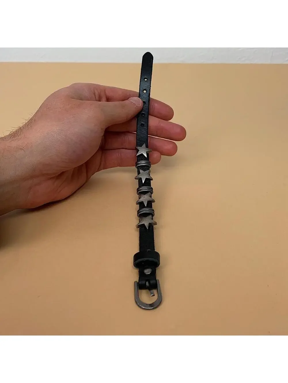 Y2k style silver star black leather bracelet. Adjustable. Cool design. Nice